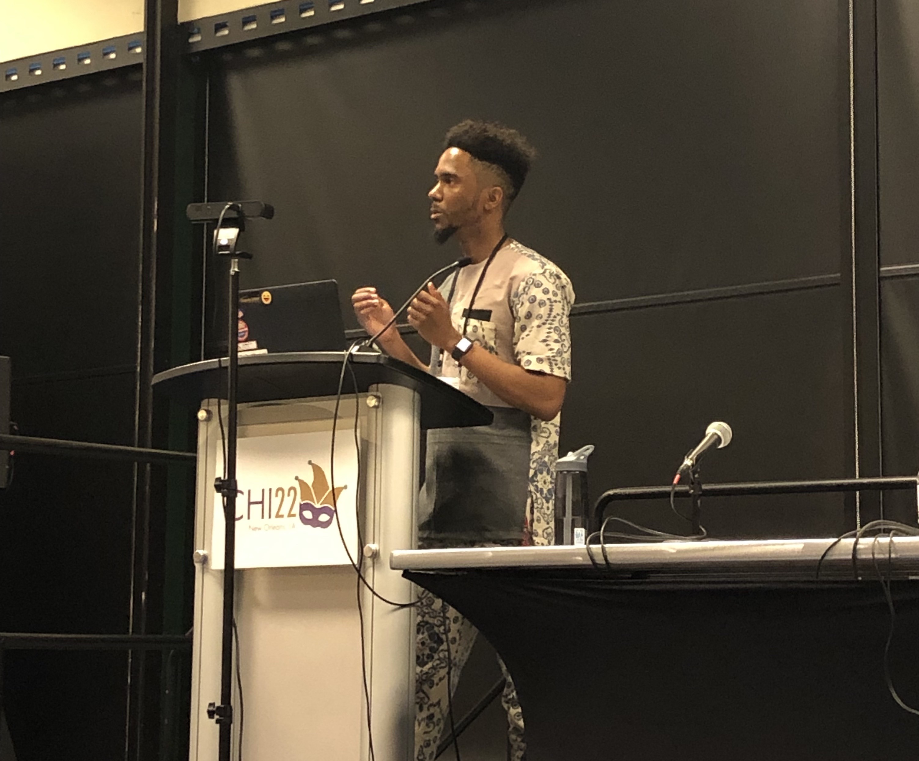 Gloire Rubambiza, a doctoral student in the field of computer science, presents his paper “Seamless Visions, Seamful Realities: Anticipating Rural Infrastructural Fragility in Early Design of Digital Agriculture,” at CHI on May 2, 2022.